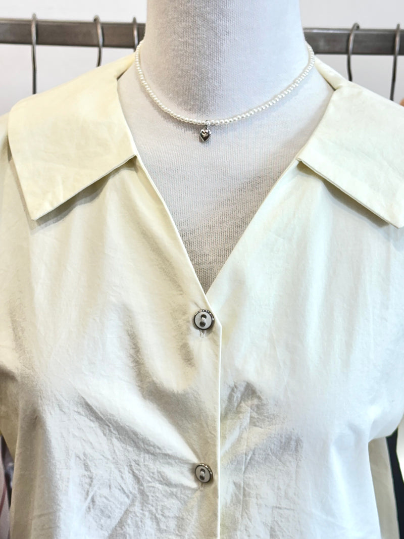 Cream short sleeve shirt