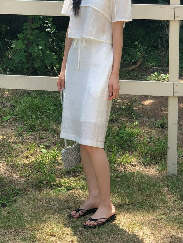 White knee-length skirt